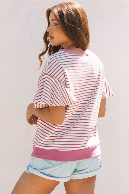Short sleeve blouse with ruffles and contrasting details in pink Sachet